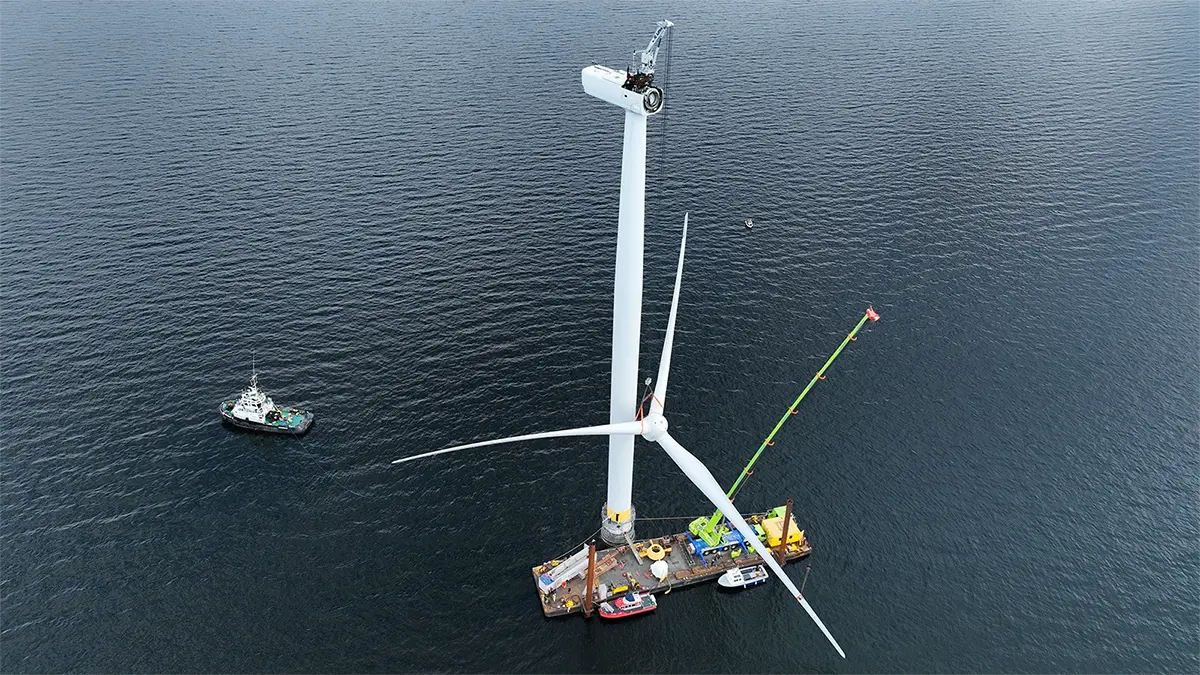 Liftra Self-Hoisting Crane lowering rotor on an offshore turbine in Europe.